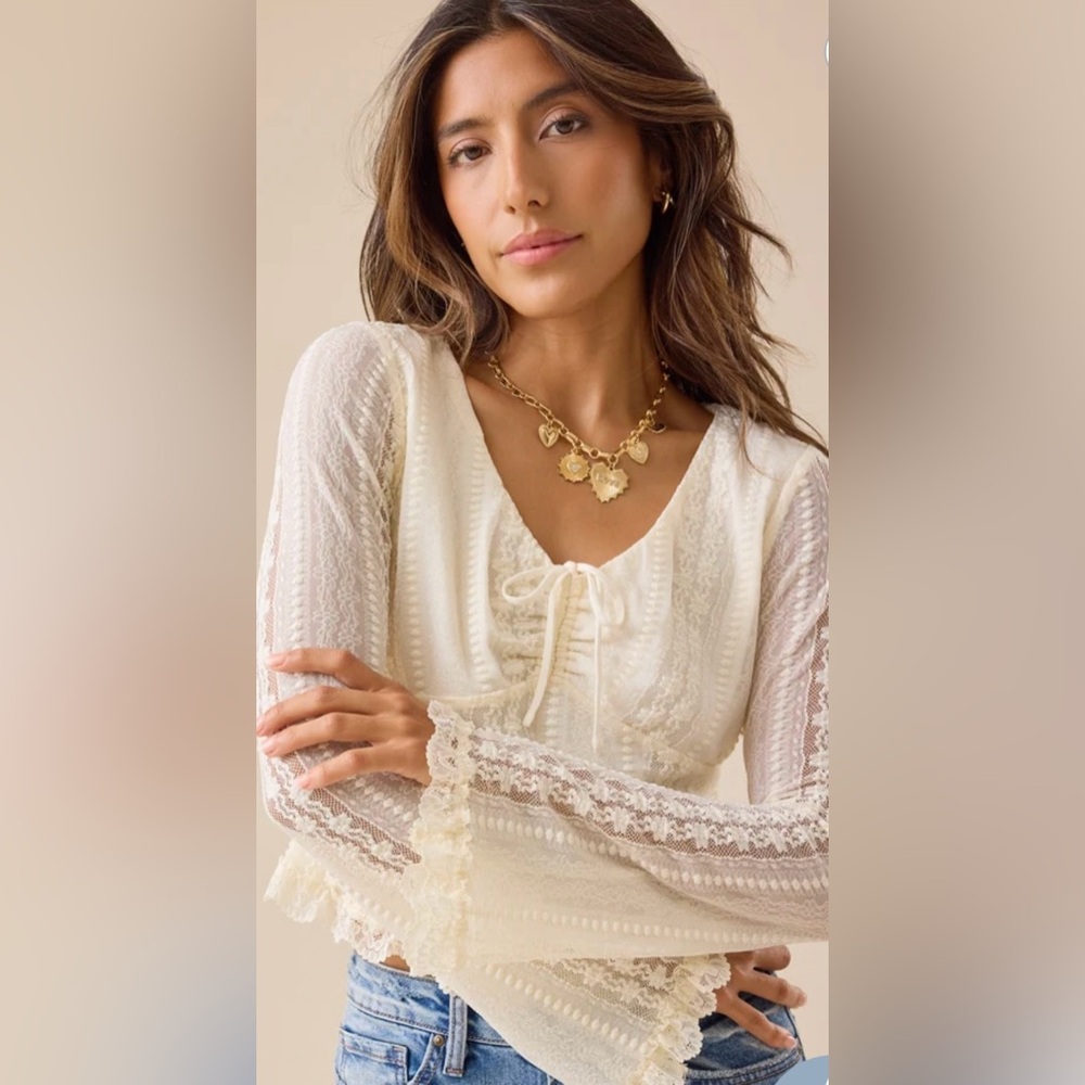 Altar'd State Boston Bell Sleeve Lace Top
Altar'd State in Ivory